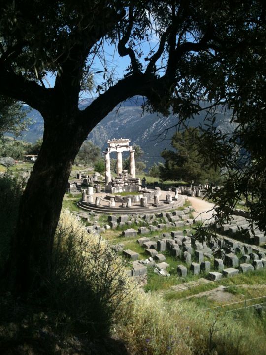 Delphi - the center of the Earth - and home to the famous oracle. The place where Zeus set the stone called "Omphalos," which was guarded by the serpent Pythos. Pythos was slain by Apollo, the brilliant god of sun, music, medicine, and other such things.